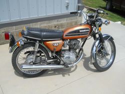 1974-honda-cb-125s-in-candy-topaz-orange-0.jpg